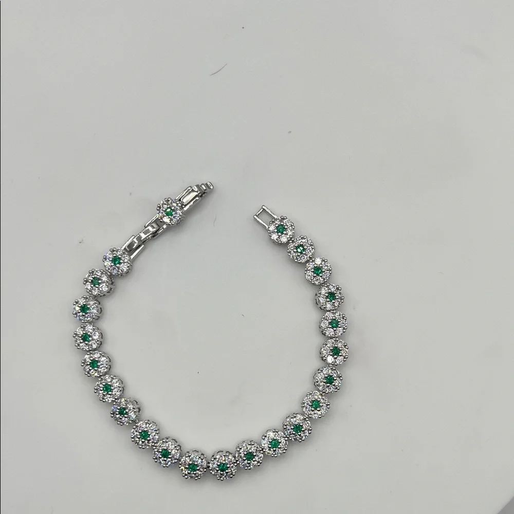 204. White Gold Plated Emerald and Crystal CZ’s 6 1/2” - 7”